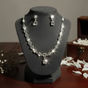 Regal Radiance: Emerald-Cut American Diamond Necklace & Drop Earring Set in Rhodium Finish