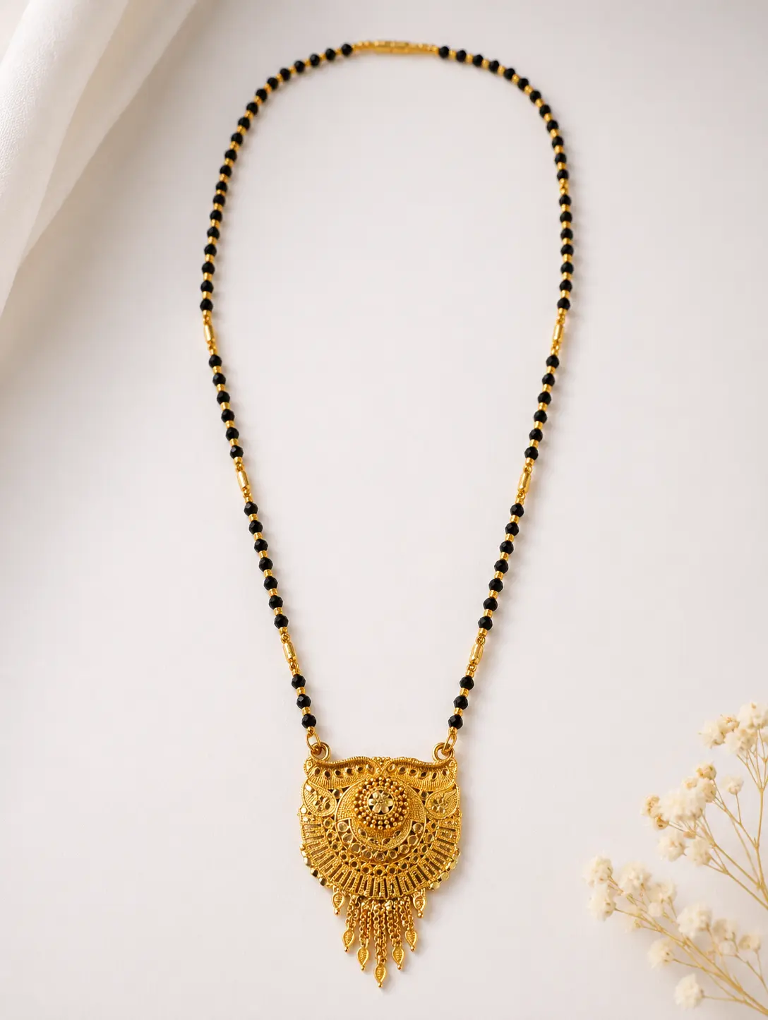 Gold Plated Traditional Black Beads Mangalsutra for Women with Designer Tassel Pendant