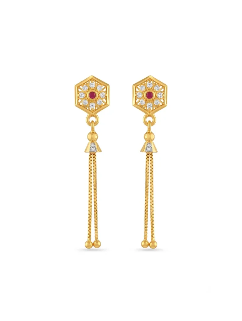 Gold plated hexagon floral stud earrings with ruby red center, sparkling CZ diamonds, and long hanging chain tassels on a clean white background.
