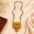 Gold Plated Traditional Black Beads Mangalsutra with Designer Peacock Tassel Pendant