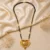Traditional Gold Plated Black Beads Mangalsutra Necklace with Antique Designer Pendant for Women